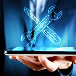 illustrated-wrench-and-screwdriver-man-holding-tablet illustrated-wrench-and-screwdriver-man-holding-tablet
